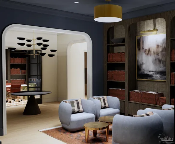 a living room with furniture and a chandelier