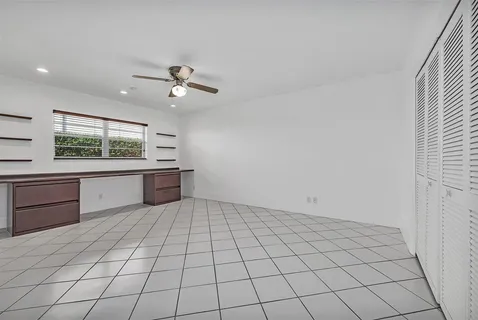 a kitchen with stainless steel appliances a sink and cabinets