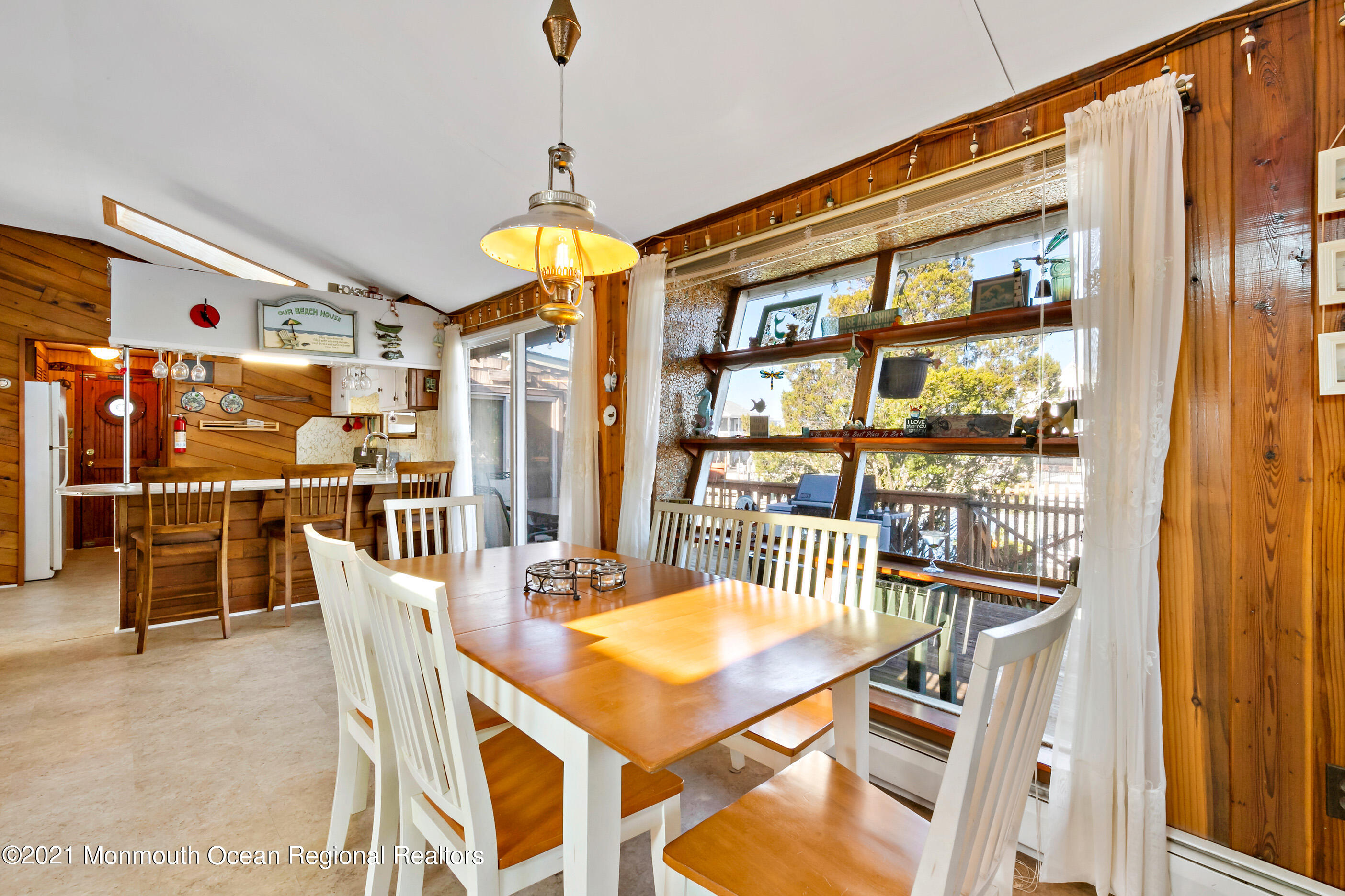 312 Heron Road Tuckerton, NJ 08087 - Photo 16 of 41 a dining room with furniture a chandelier and window