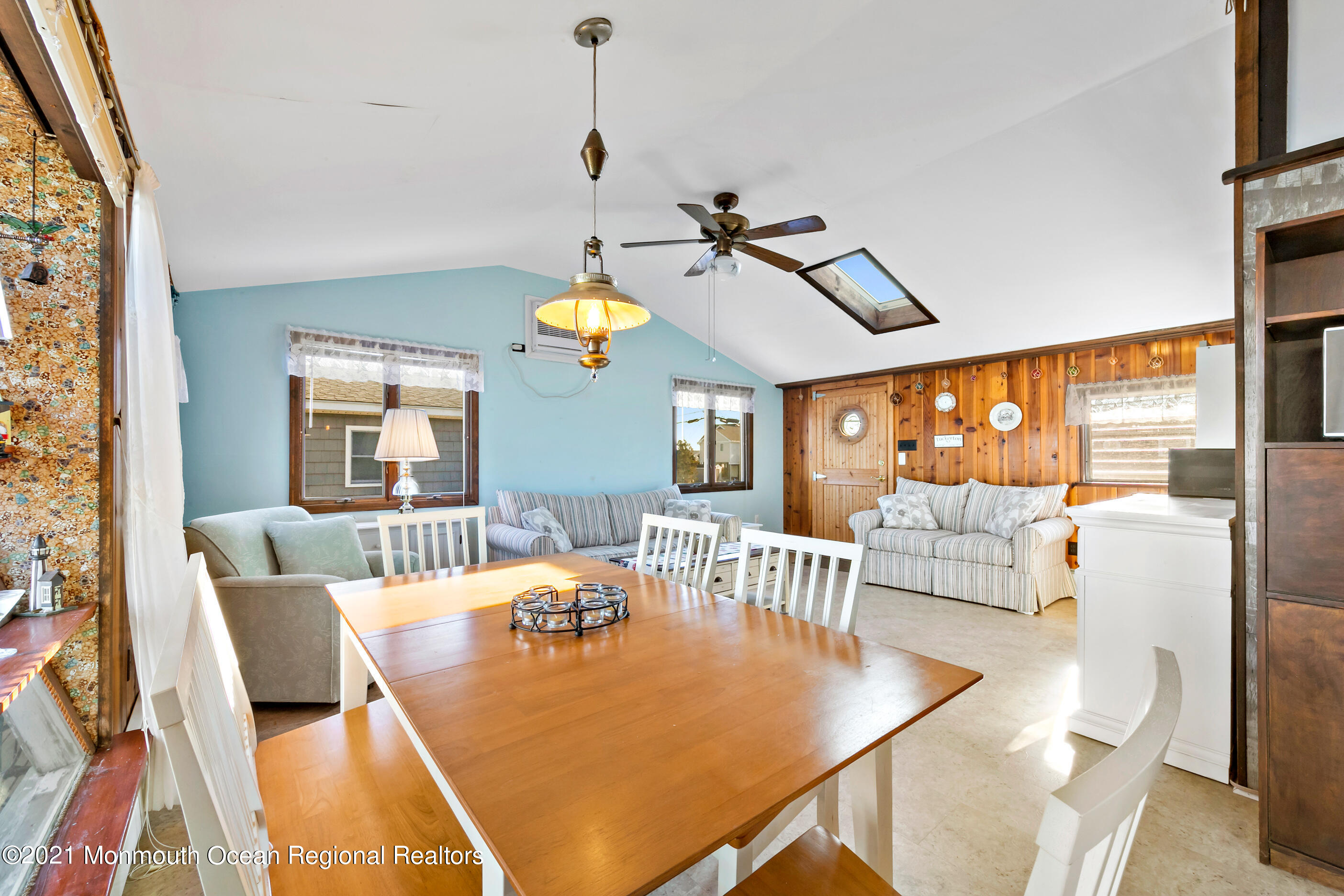 312 Heron Road Tuckerton, NJ 08087 - Photo 18 of 41 a view of a dining room with furniture a chandelier and wooden floor