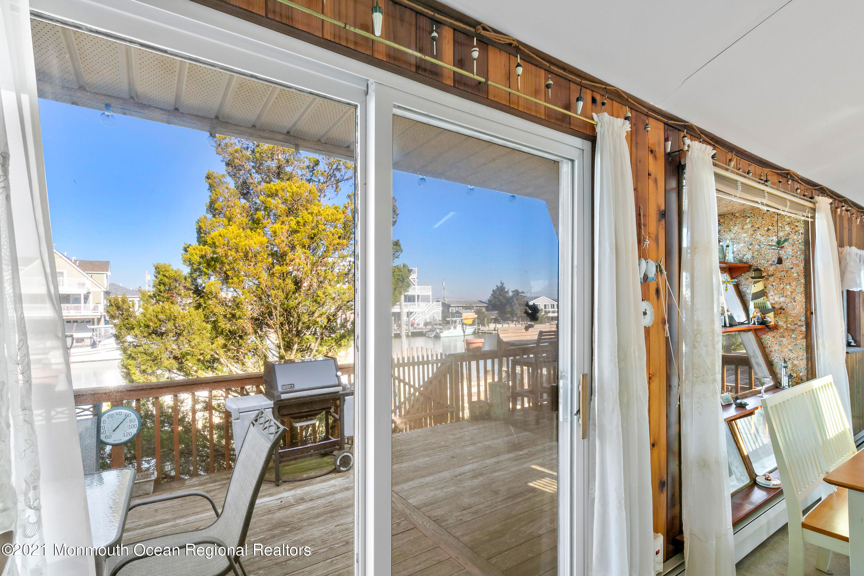 312 Heron Road Tuckerton, NJ 08087 - Photo 19 of 41 a view of porch with a dining table and chairs