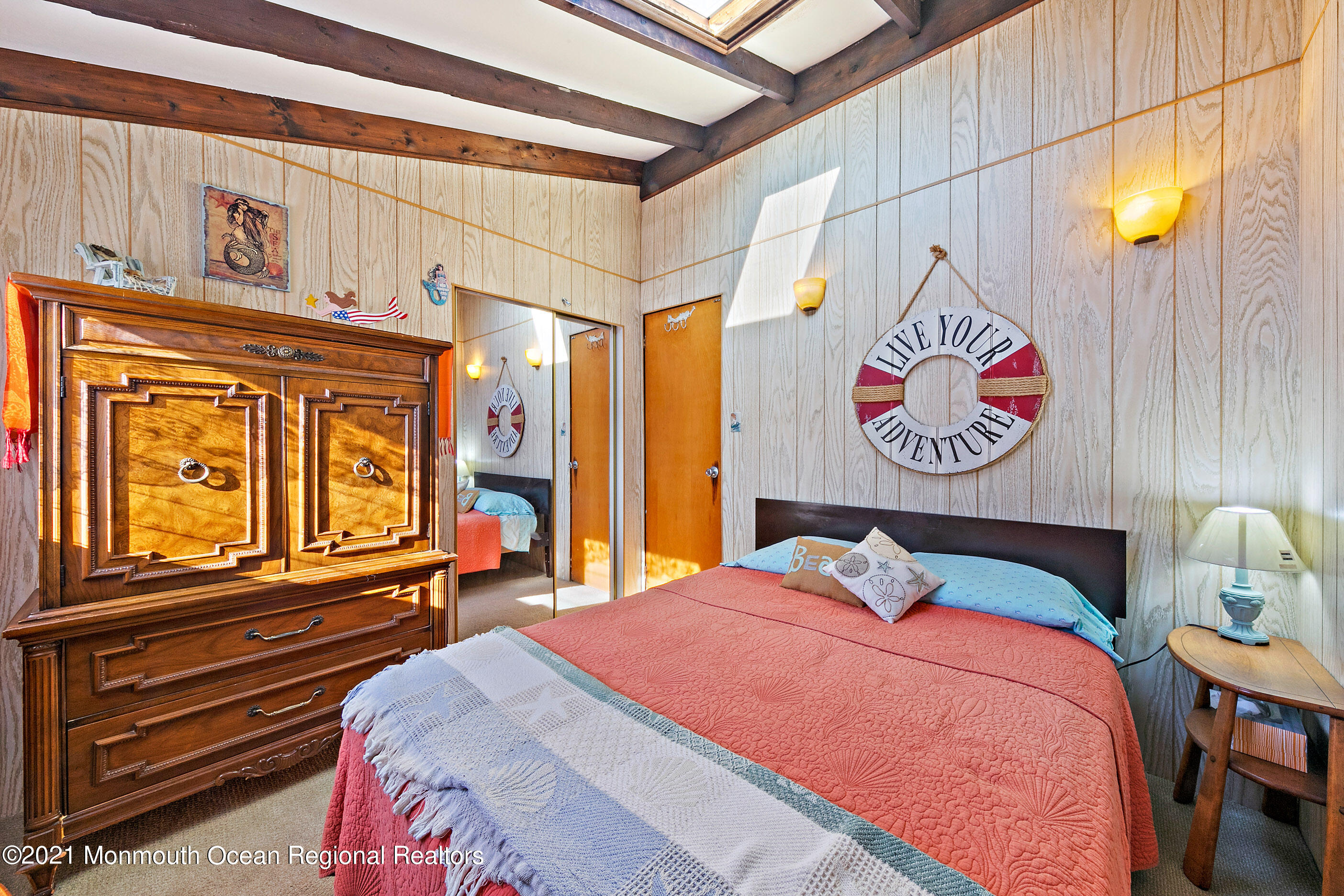 312 Heron Road Tuckerton, NJ 08087 - Photo 22 of 41 a bedroom with a bed and paintings on the wall