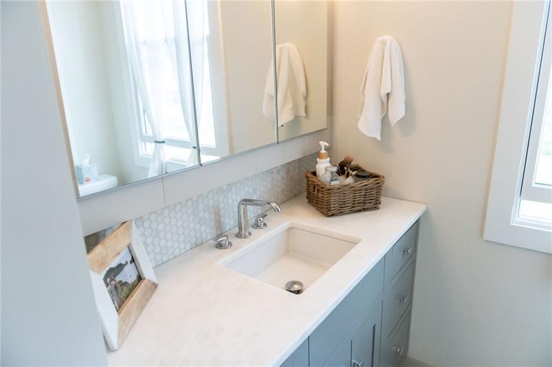317 Pine Road Sewickley, PA 15143 - Photo 15 of 24 Hallway bath with marble hexagon tile backsplash