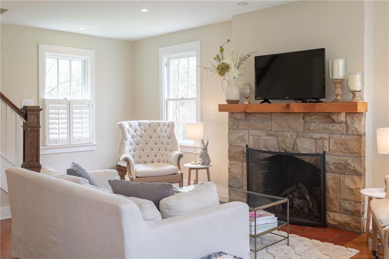 317 Pine Road Sewickley, PA 15143 - Photo 3 of 24 Stone fireplace surround and hardwood floors