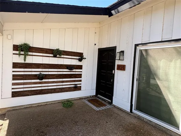 a refrigerator freezer sitting inside of a kitchen