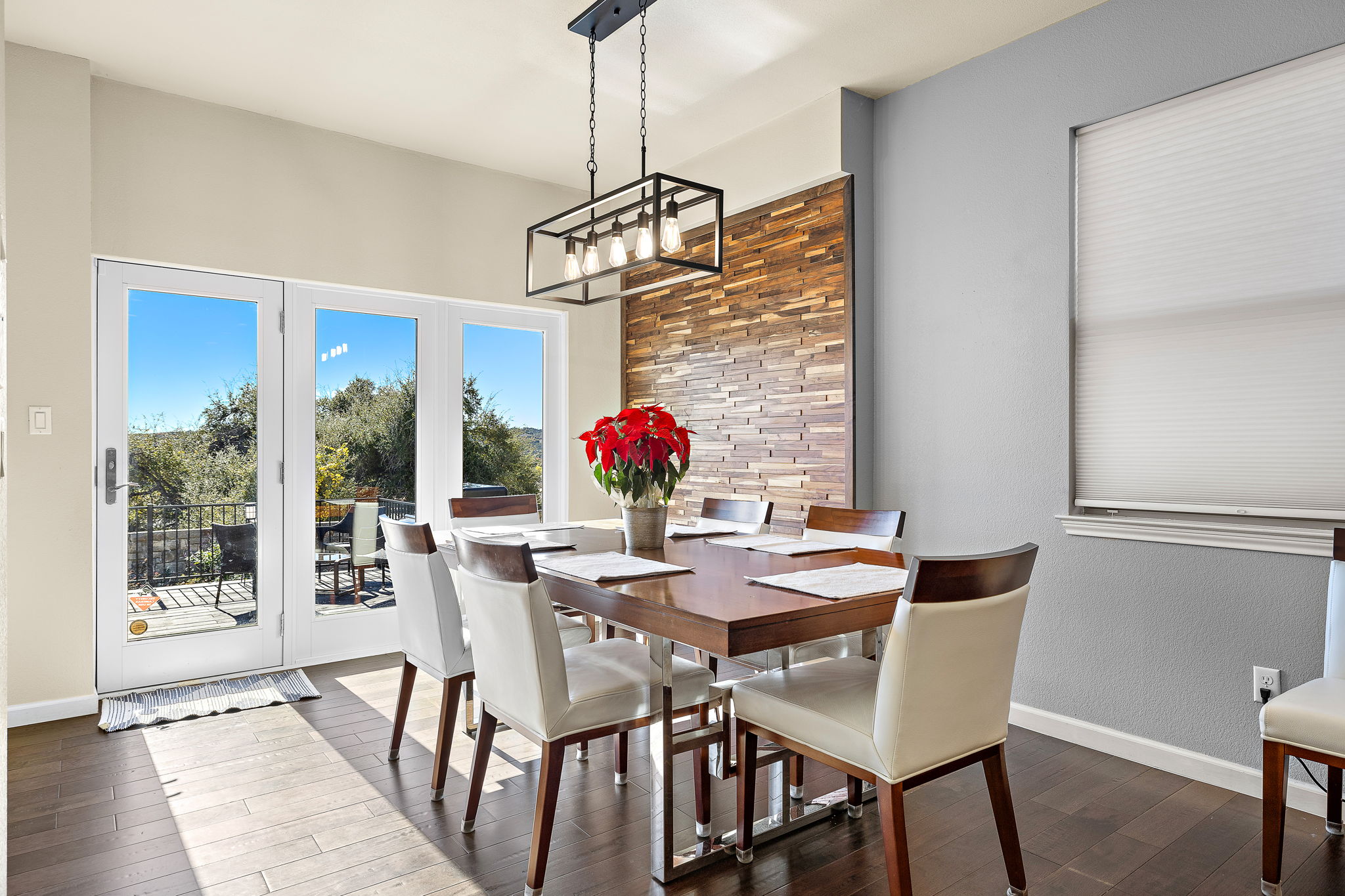4413 Tambre Bend Austin, TX 78738 - Photo 10 of 30 a view of a dining room with furniture wooden floor and chandelier