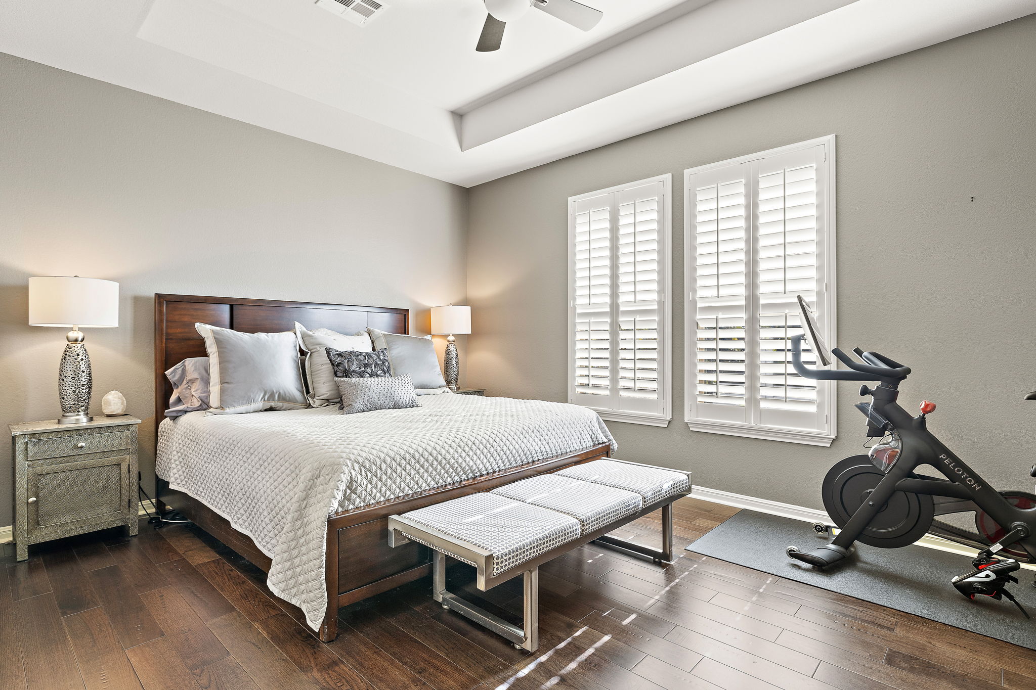 4413 Tambre Bend Austin, TX 78738 - Photo 12 of 30 a bedroom with a bed a table and a couch