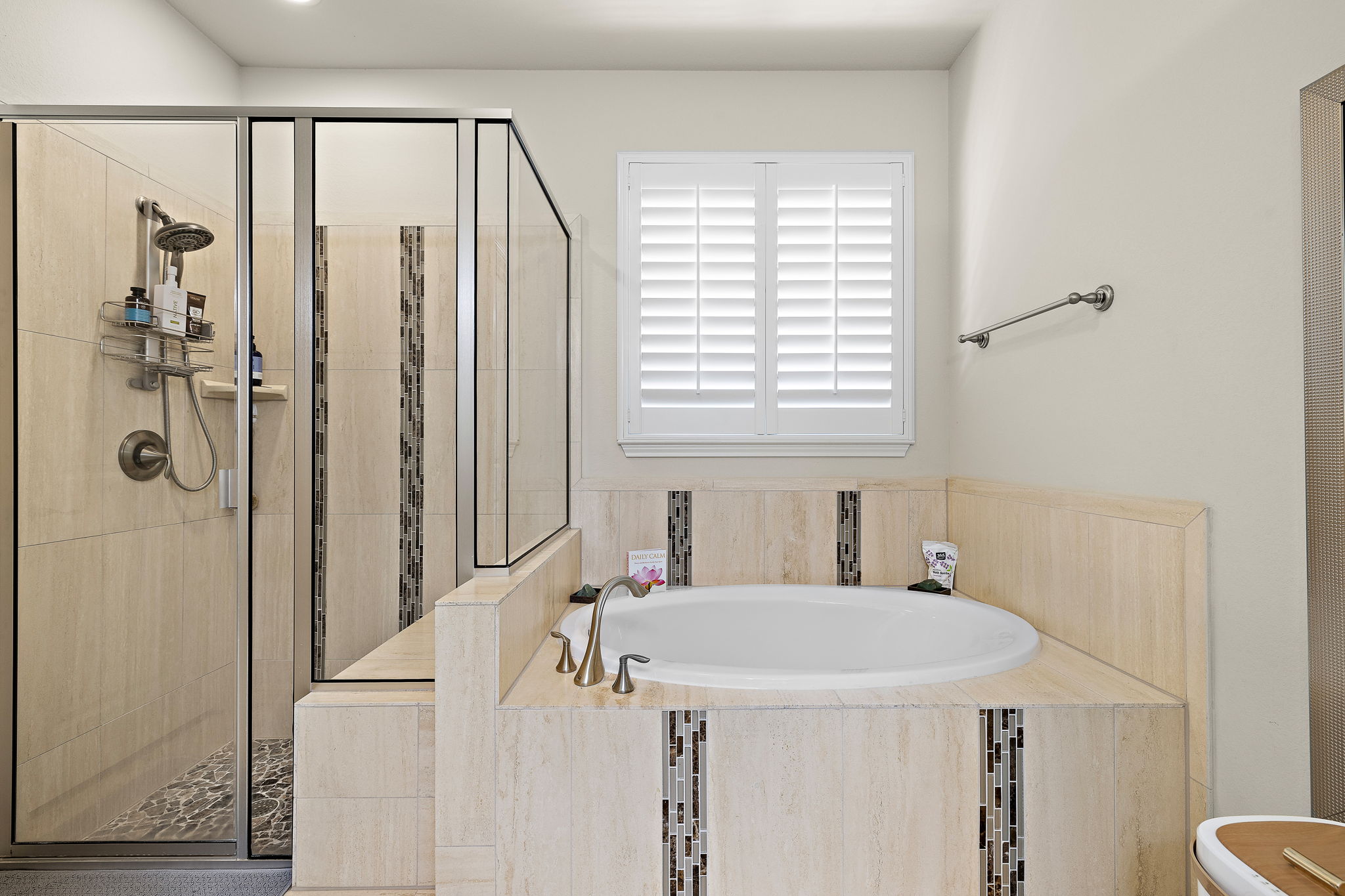 4413 Tambre Bend Austin, TX 78738 - Photo 14 of 30 a bathroom with a sink a mirror and a shower
