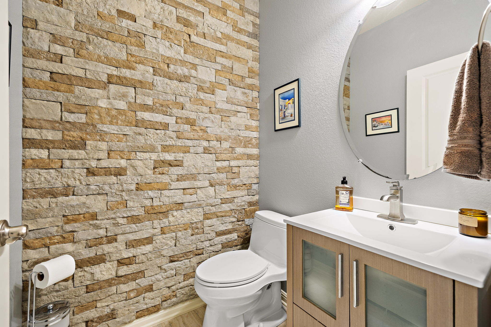4413 Tambre Bend Austin, TX 78738 - Photo 18 of 30 a bathroom with a sink toilet and mirror