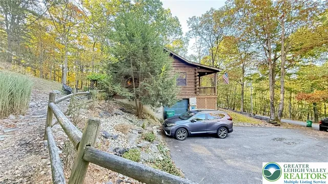 a view of a car parked on the side of the road