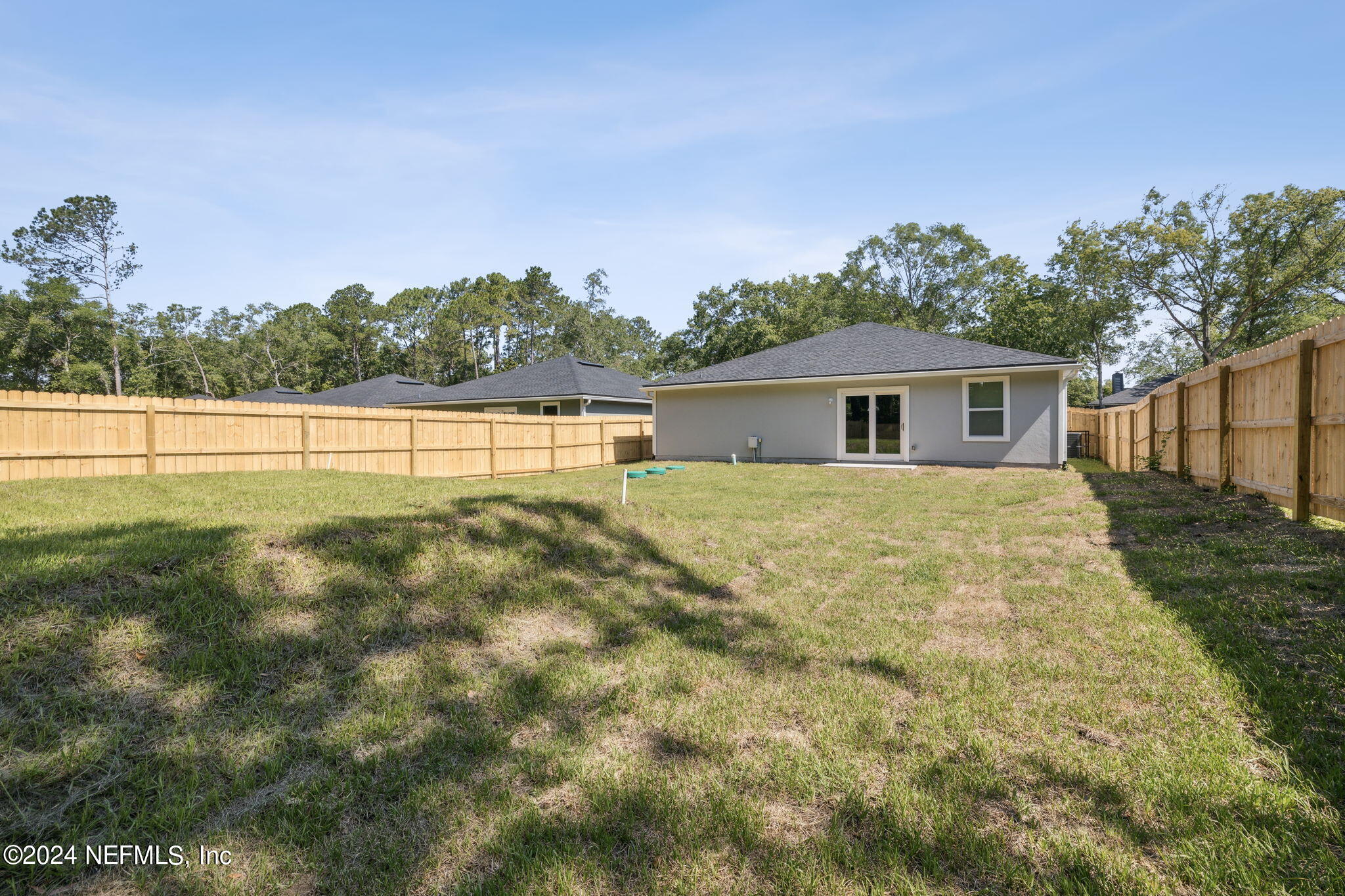8320 Maple Street Jacksonville, FL 32244 - Photo 29 of 32 a view of house with yard and ocean view