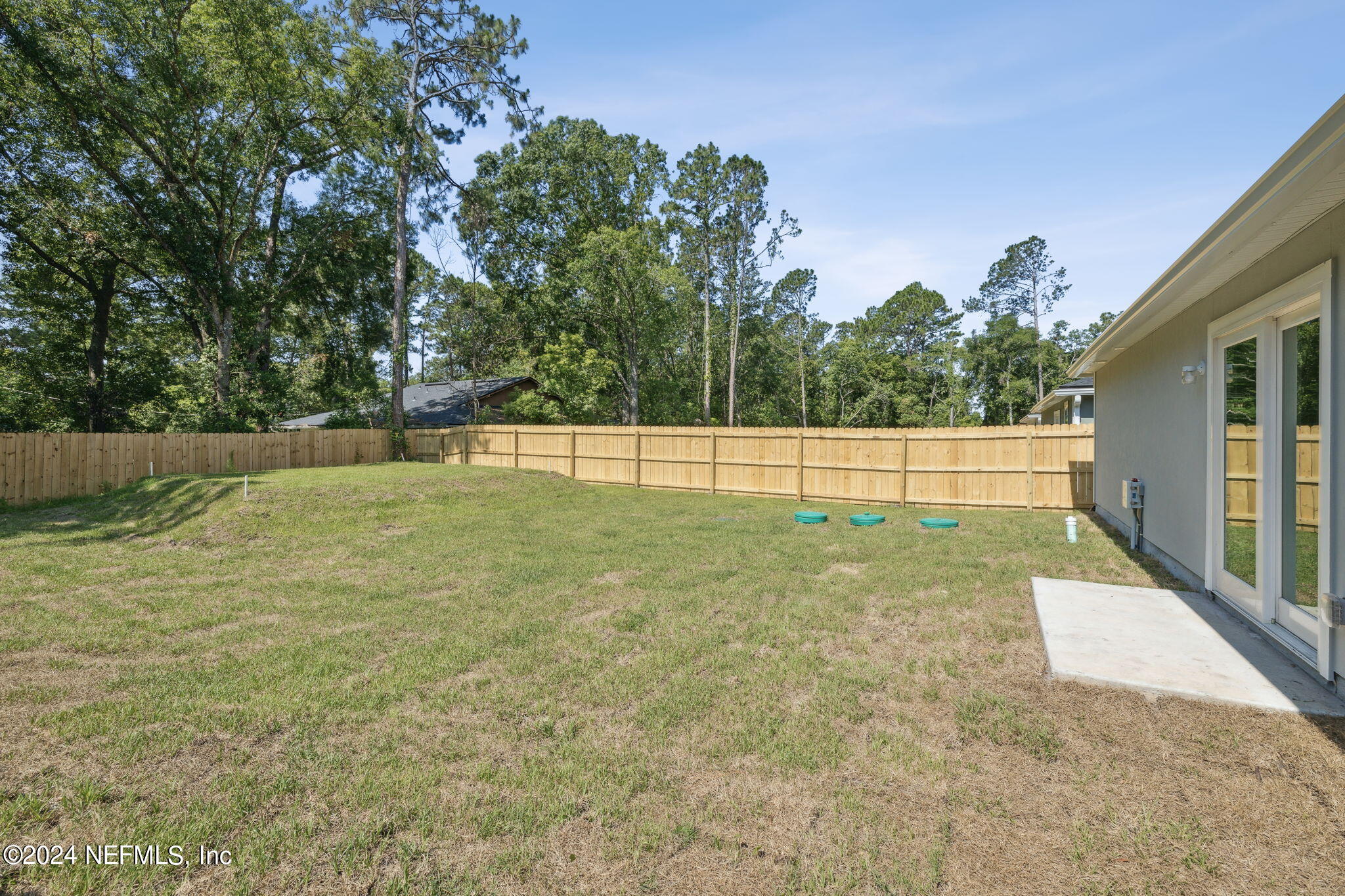 8320 Maple Street Jacksonville, FL 32244 - Photo 30 of 32 a view of a backyard