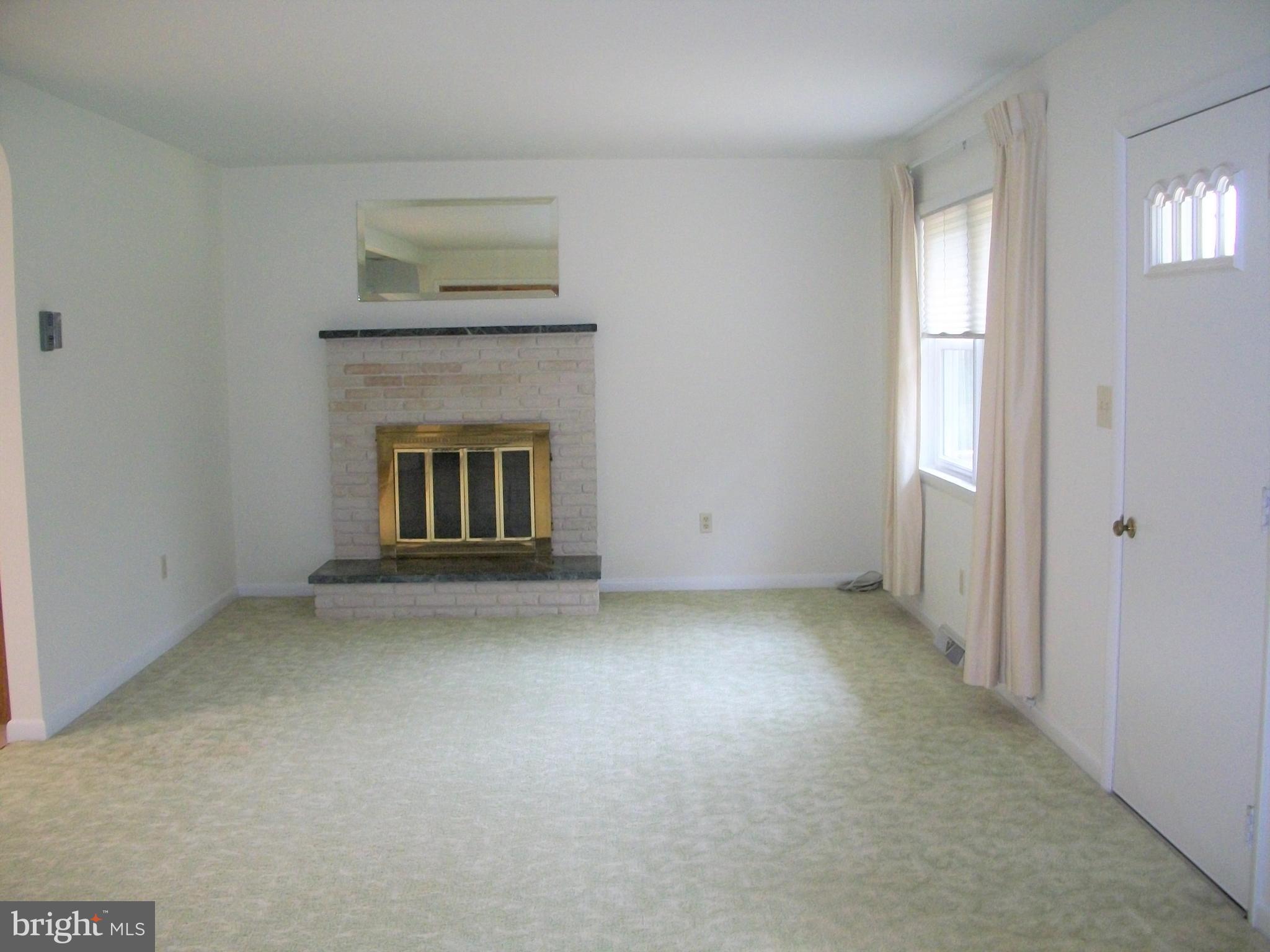 2508 Rocks Road Forest Hill, MD 21050 - Photo 14 of 51 Living Room with wood burning fireplace