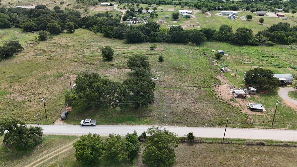 497 Big Sandy Road Newcastle, TX 76372 - Photo 22 of 22 Expansive undeveloped lot featuring mature trees and a flat topography