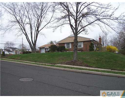 2 Crabtree Road Old Bridge, NJ 07747 - Photo 2 of 13 a view of a house with a yard