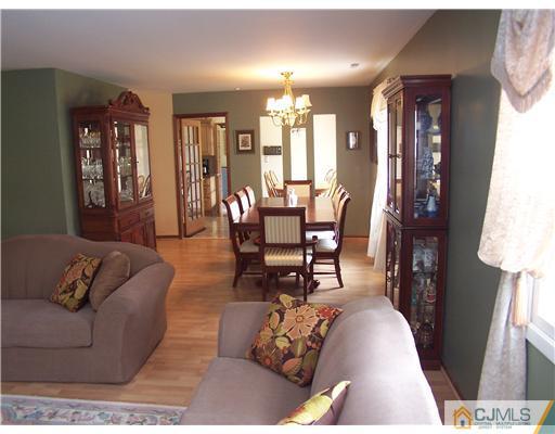 2 Crabtree Road Old Bridge, NJ 07747 - Photo 3 of 13 a living room with furniture and wooden floor