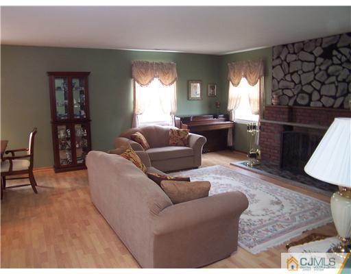 2 Crabtree Road Old Bridge, NJ 07747 - Photo 5 of 13 a living room with furniture and a window