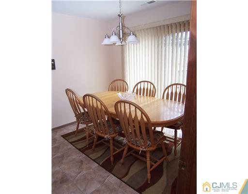 2 Crabtree Road Old Bridge, NJ 07747 - Photo 8 of 13 a view of a dining room with furniture and window