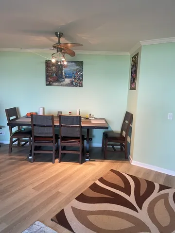 a bed room with a bed and a chair