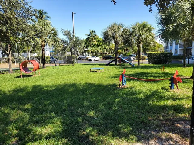 a garden view with a fountain