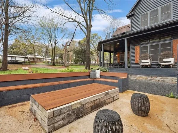 a house view with a backyard space