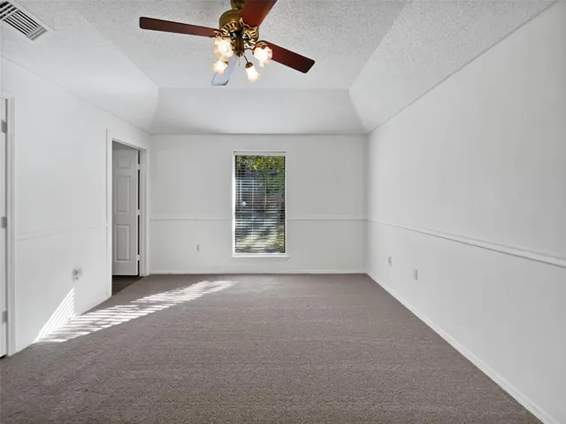 a bathroom with a sink a toilet a shower and a mirror