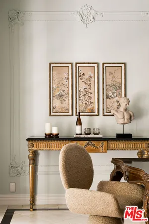 a living room with granite countertop furniture and a window