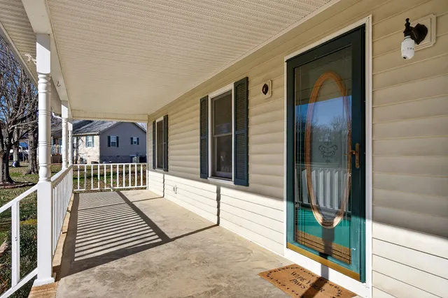 a view of a balcony with door