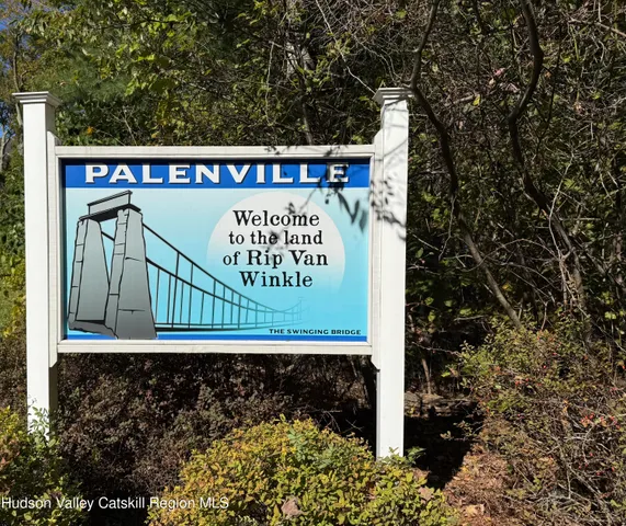 a sign on the side of a road