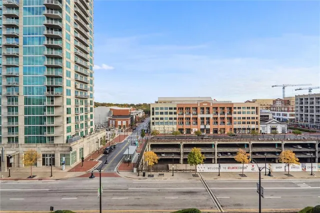 a view of a building with a street