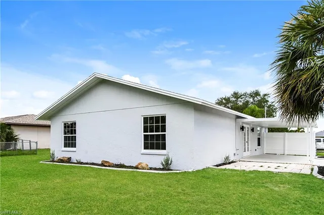 a front view of house with yard