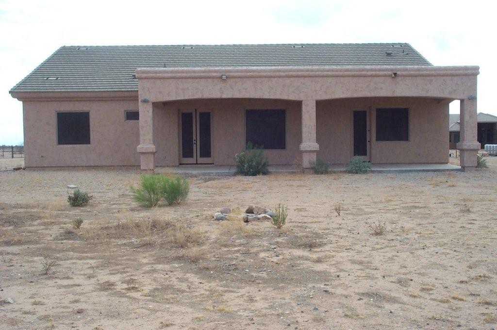 21104 West Sleepy Ranch Road Wittmann, AZ 85361 - Photo 2 of 6 Back of home