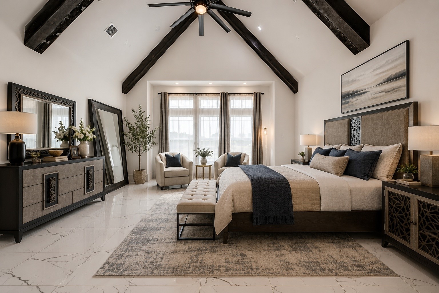 4821 Walters Road Richmond, TX 77469 - Photo 31 of 50 This luxurious primary suite showcases soaring vaulted ceilings with dramatic exposed wood beams, creating a grand yet inviting atmosphere. The expansive layout is complemented by sleek marble-style flooring, oversized windows that flood the room with natural light, and elegant modern furnishings throughout. A sophisticated neutral color palette, designer lighting, and a cozy sitting area add warmth and refinement, contemporary finishes make the space feel like a private five-star retreat.