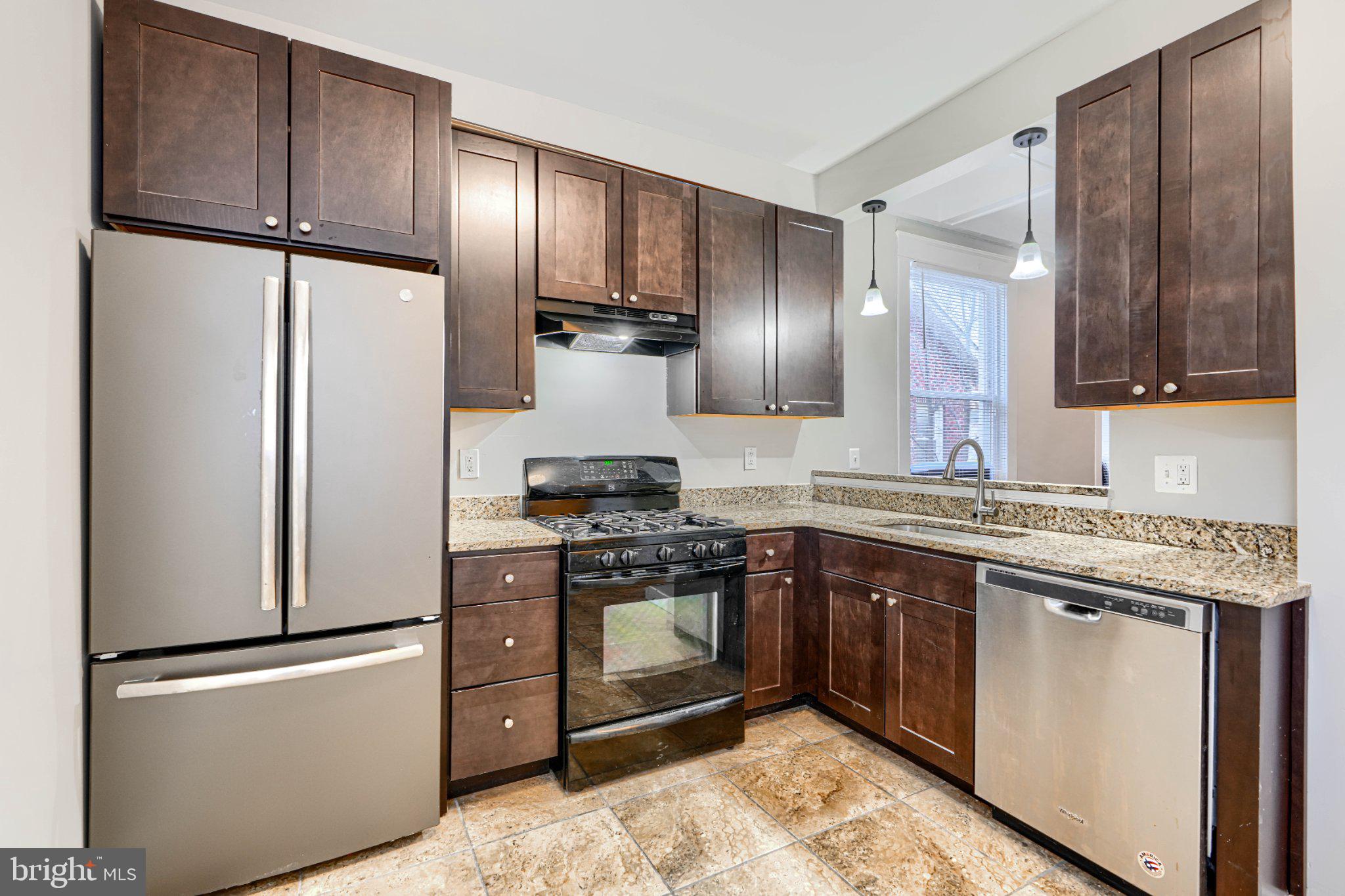 3414 Alto Road, Unit 1 Baltimore, MD 21216 - Photo 13 of 18 Modern kitchen with sleek finishes.