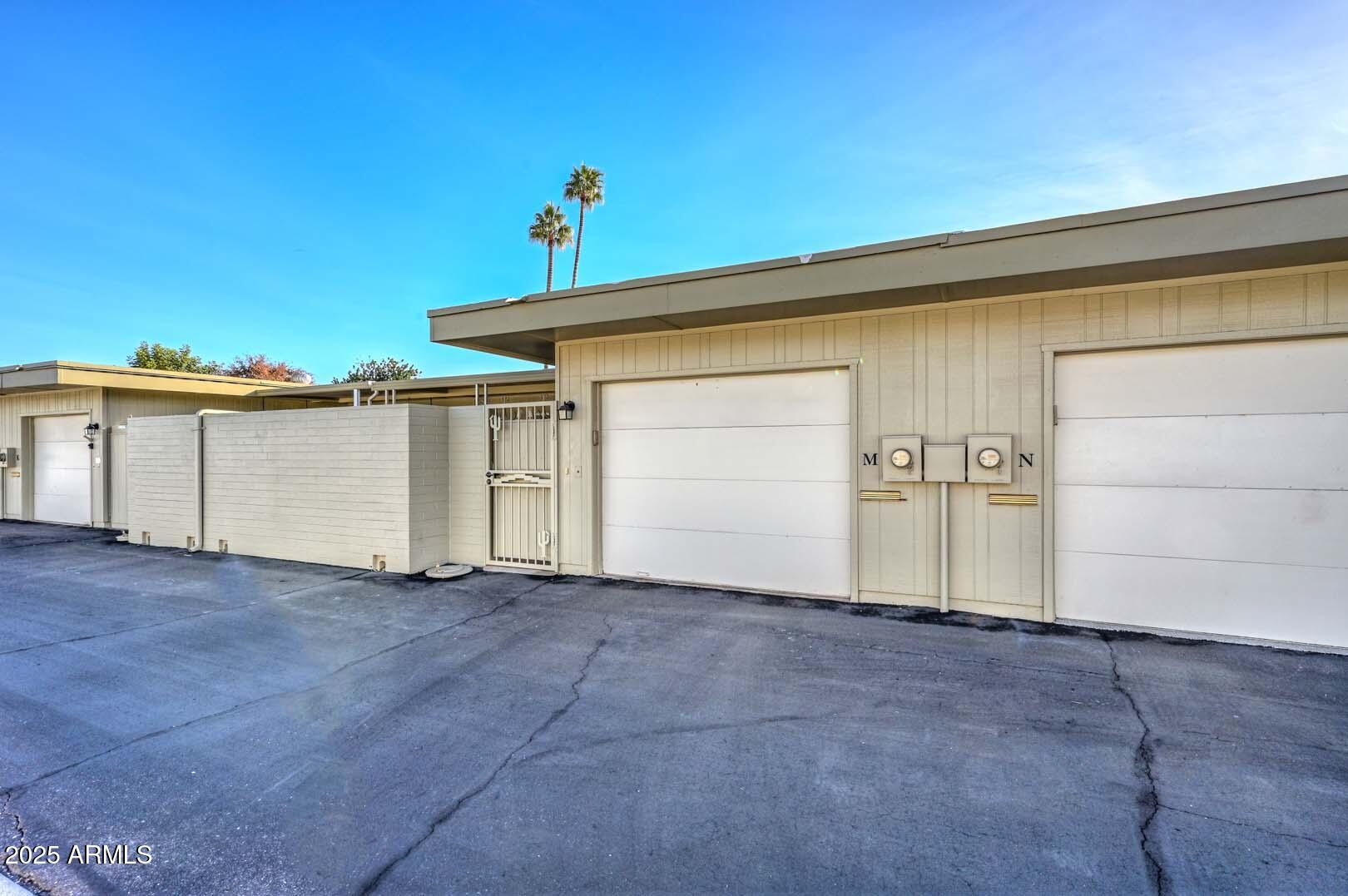 9970 West Royal Oak Road, Unit M Sun City, AZ 85351 - Photo 25 of 35 Rear Garage