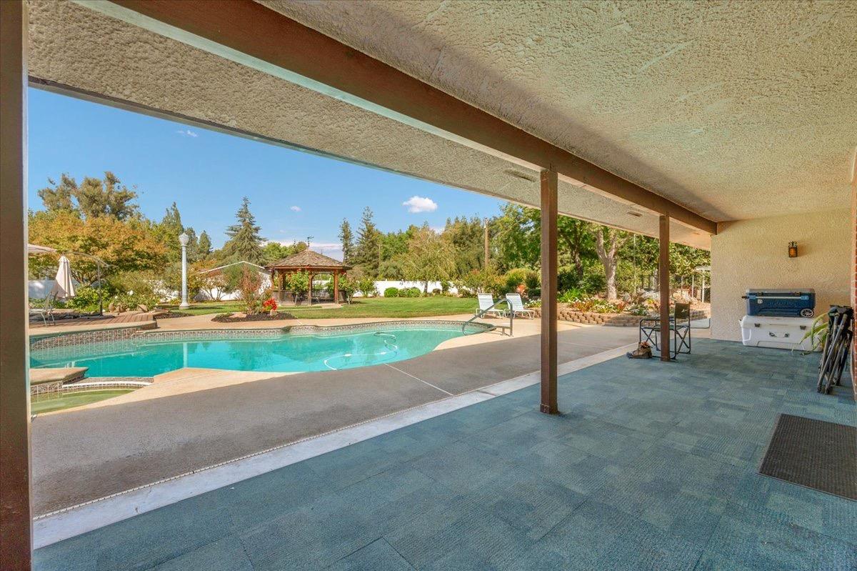 41071 Adobe Way Madera, CA 93636 - Photo 12 of 27 a view of a building with a yard