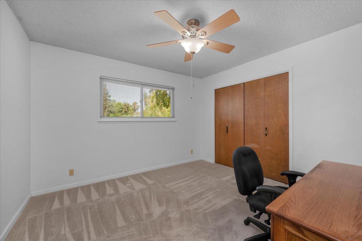41071 Adobe Way Madera, CA 93636 - Photo 18 of 27 a view of a workspace with furniture and a window