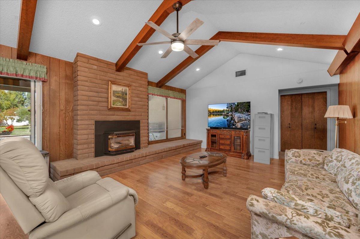 41071 Adobe Way Madera, CA 93636 - Photo 20 of 27 a living room with furniture and a fireplace
