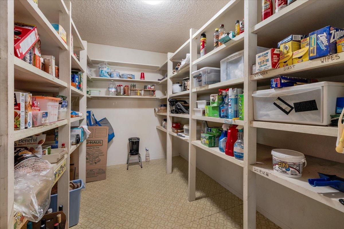 41071 Adobe Way Madera, CA 93636 - Photo 21 of 27 a view of store room with racks