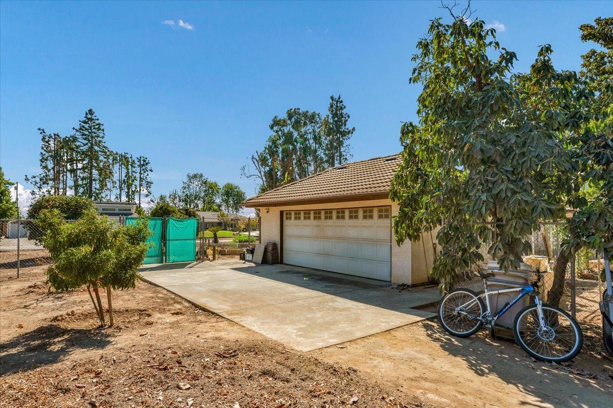 41071 Adobe Way Madera, CA 93636 - Photo 6 of 27 a view of a backyard with sitting area and garden