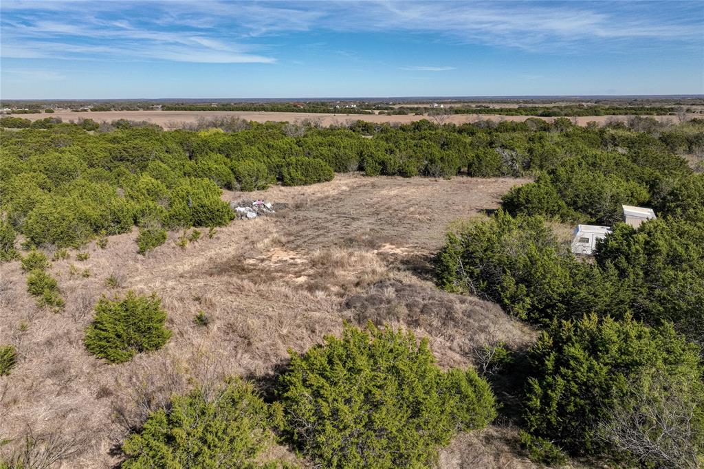 693 Garrett Lane China Spring, TX 76633 - Photo 10 of 16 a view of a pathway with a garden
