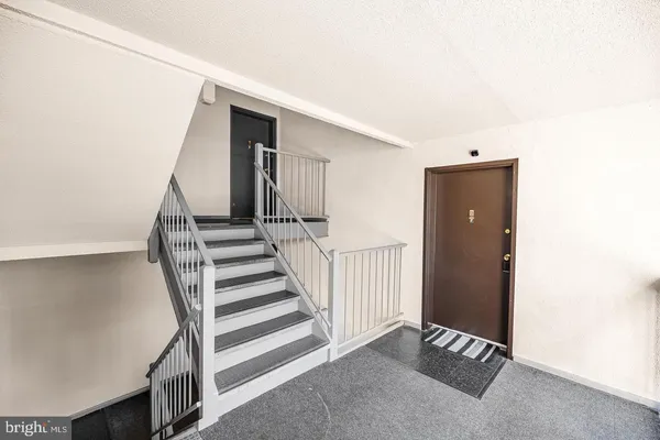 a view of a hallway with entryway