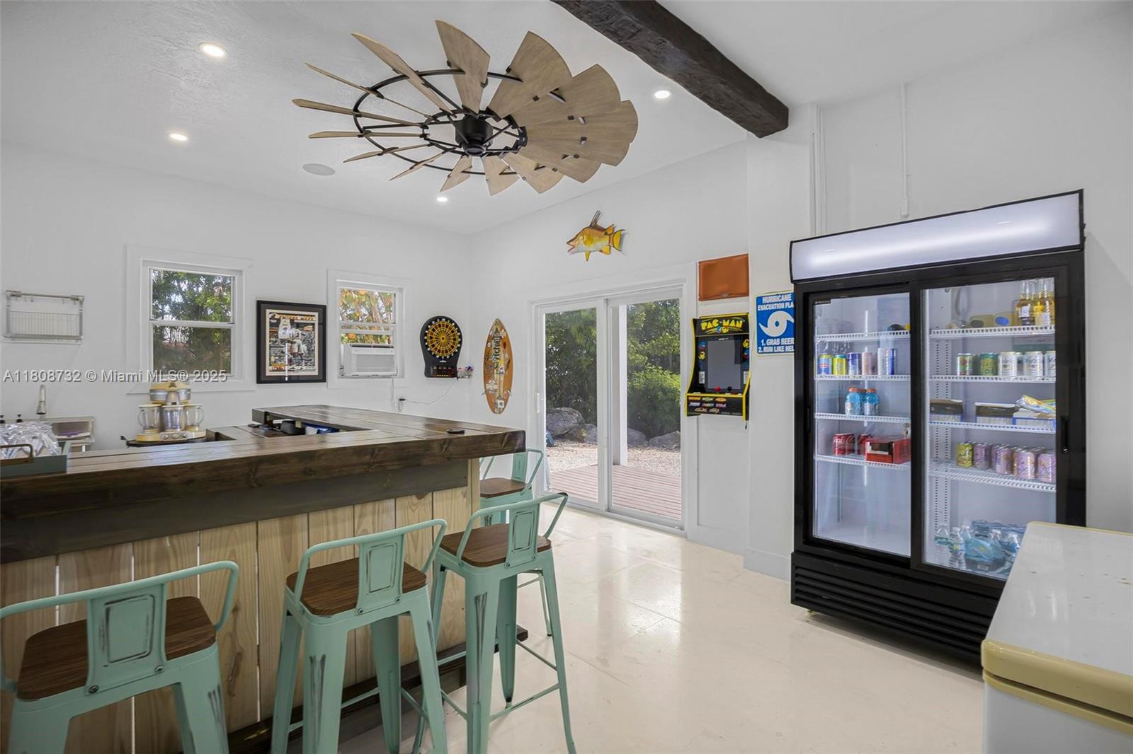 41 Mutiny Place Key Largo, FL 33037 - Photo 39 of 69 a dining hall with stainless steel appliances granite countertop a stove and cabinets