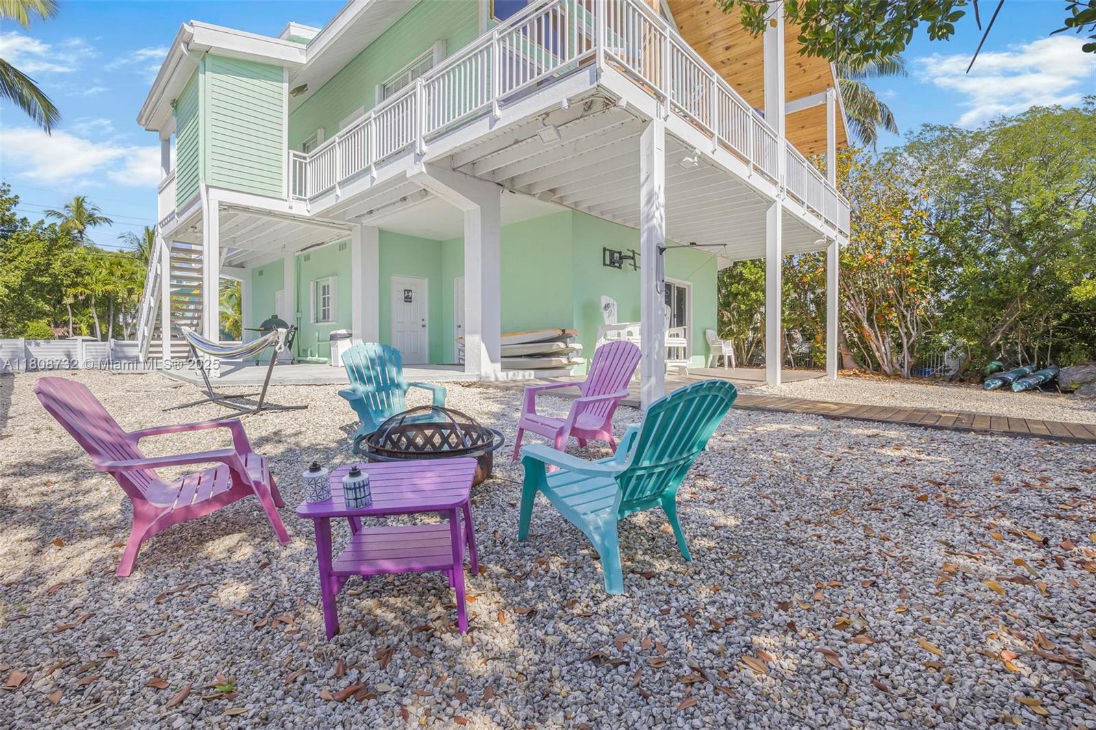 41 Mutiny Place Key Largo, FL 33037 - Photo 7 of 69 a view of a house with backyard porch and sitting area