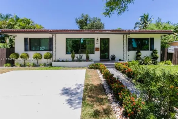 front view of a house with a patio