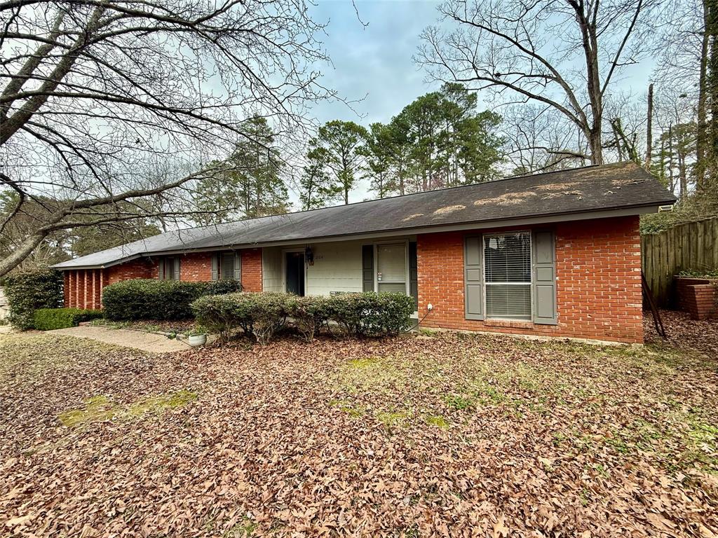 2104 Greenbriar Drive Ruston, LA 71270 - Photo 1 of 35 a front view of a house with a yard