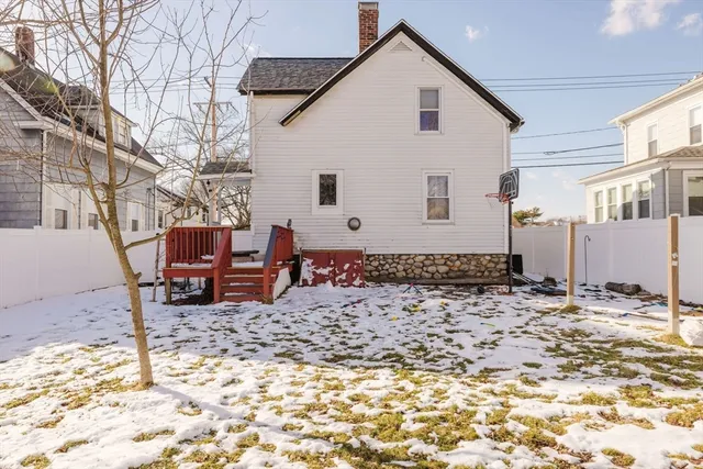 a view of a yard with a house and sitting area