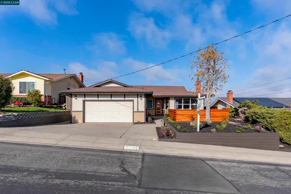 a view of a house with a street