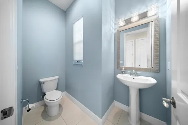 a living room with lots of furniture and a gym