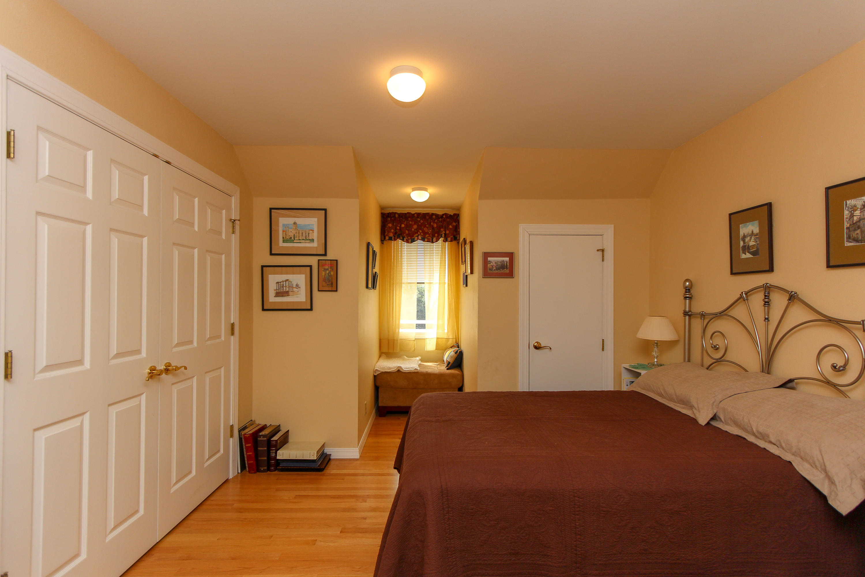 3225 Fitzpatrick Road Tillamook, OR 97141 - Photo 29 of 50 a bedroom with a bed and a view of bathroom
